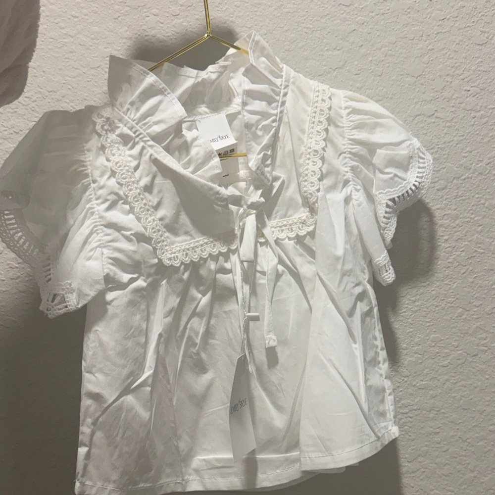 White Ruffled Blouse